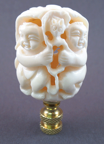 Finial: Lg Carved Ox Bone with Children. 3" overall