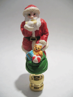 Lamp Finial: Small Santa with Green Bag of Toys. 3" overall