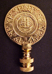 Brass coin with ship 2 3/4 inch finial