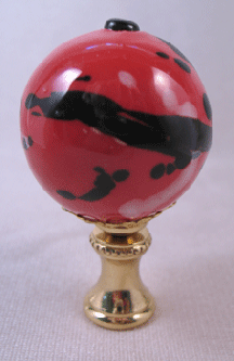 Finial:  Lg Red and Black Ceramic Ball. 2 1/2" overall